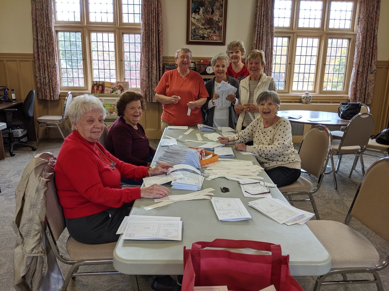 Volunteers helping us get our monthly newsletter out.